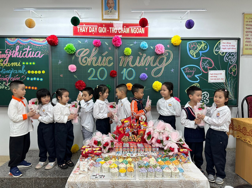 A group of children in white shirts standing in front of a cake

Description automatically generated with low confidence