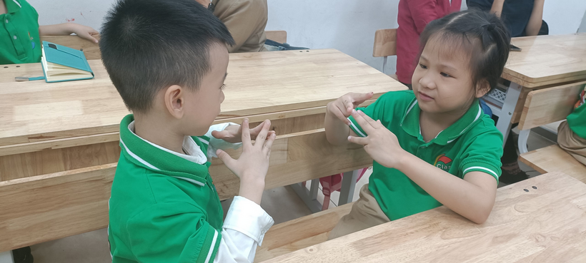A picture containing child, child, little, young

Description automatically generated