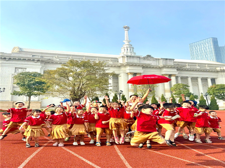A group of children in uniform

Description automatically generated