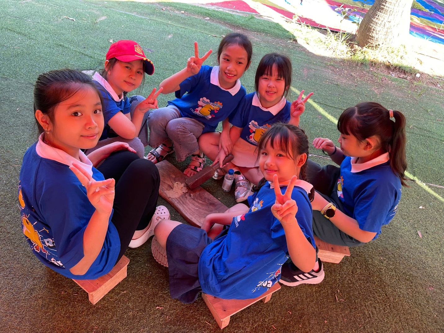 A group of girls in matching shirts

AI-generated content may be incorrect.