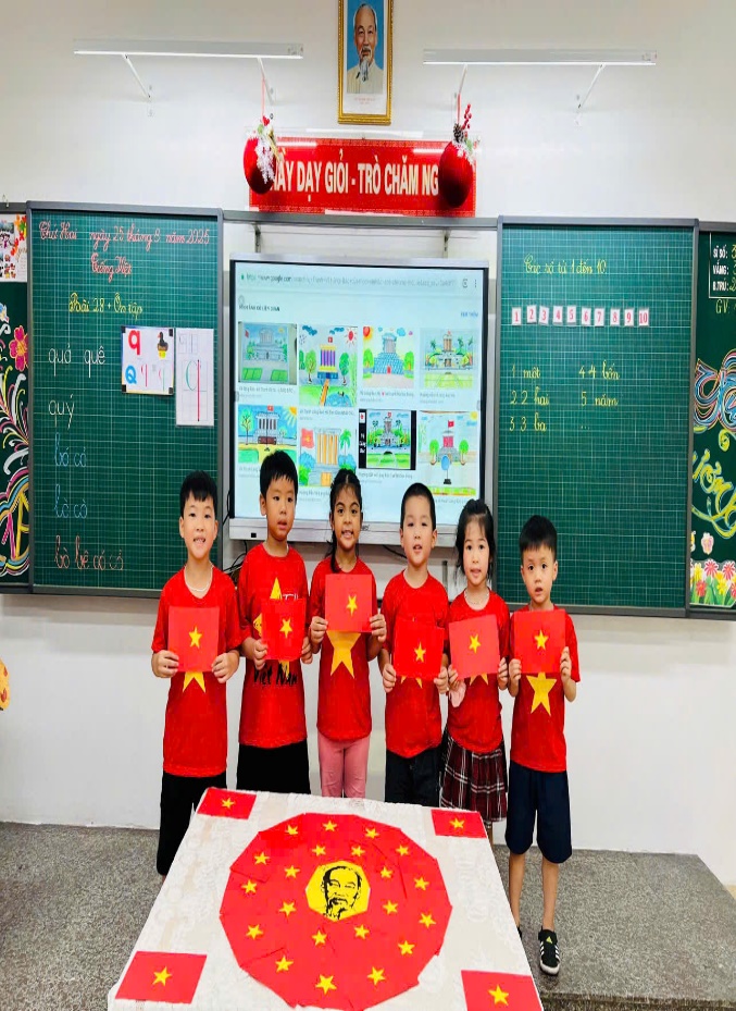 A group of children holding up red shirts

AI-generated content may be incorrect.