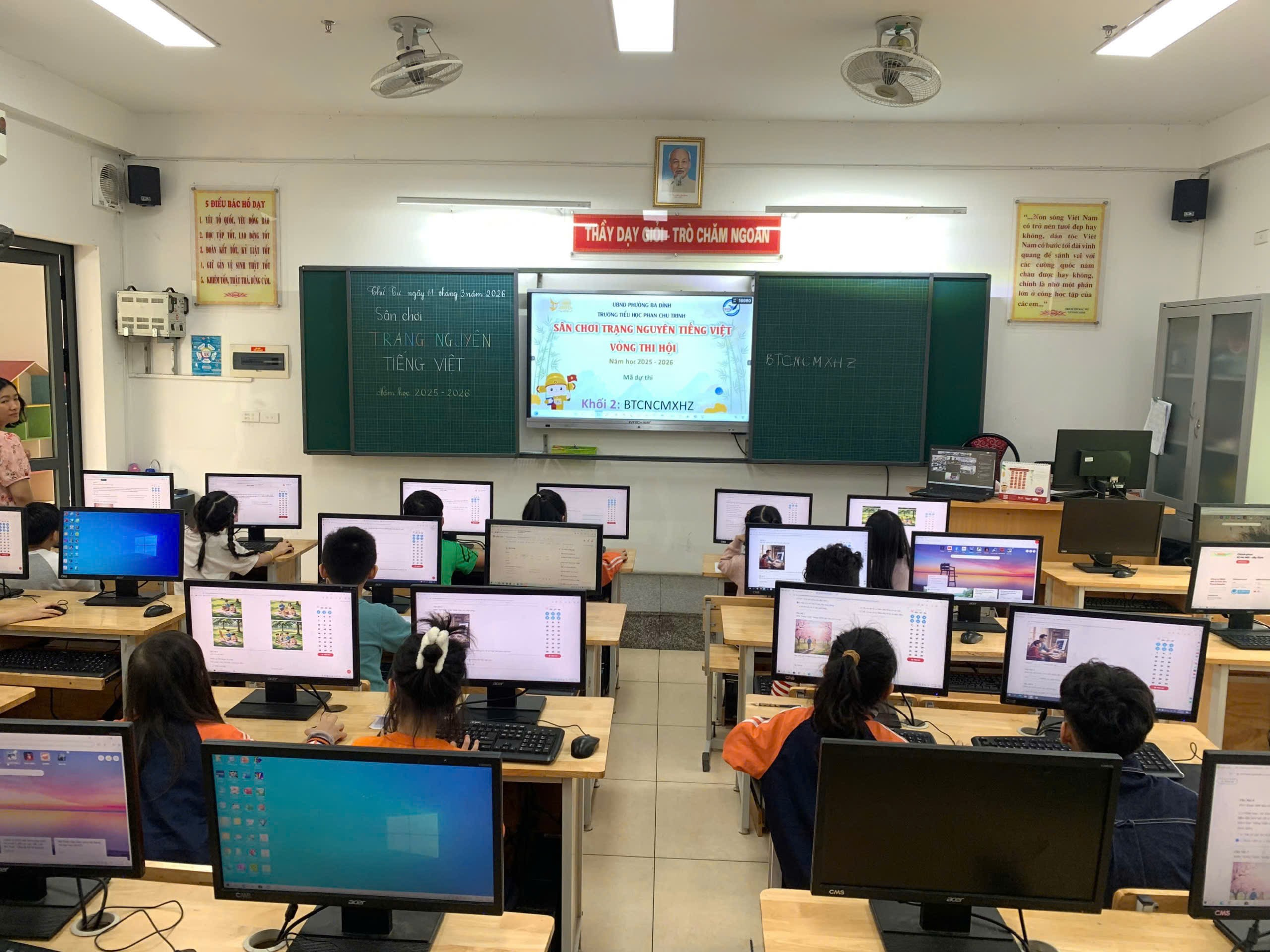 A group of people sitting at computers in a classroom

AI-generated content may be incorrect.